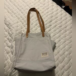 Feed tote, tons of pockets - perfectly sized (not tiny but not huge)
